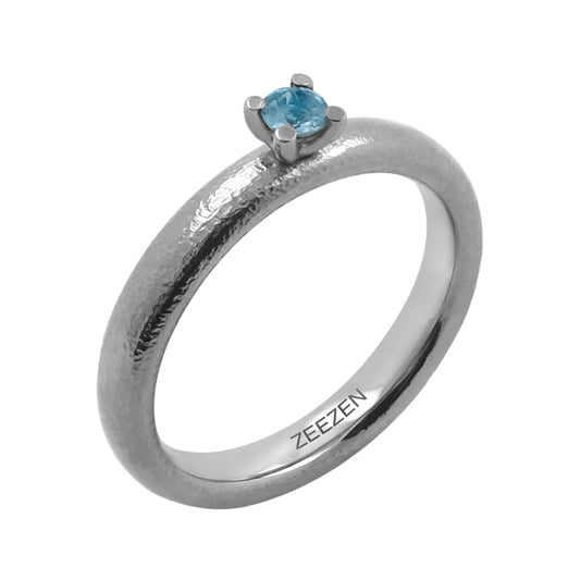 Ring med Swiss Blue topas – finhamret/poleret